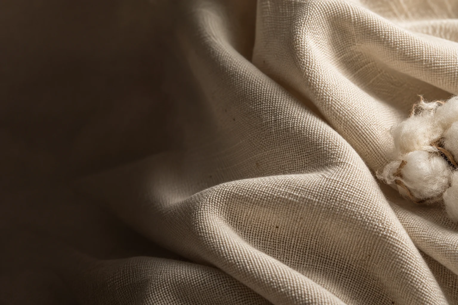 Warm ivory cotton folds with a fine matte weave