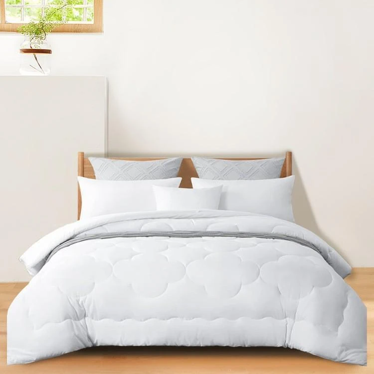 Clover-quilted cotton-shell duvet