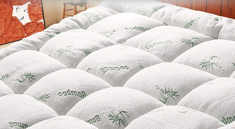 Thick bamboo-fiber mattress pad