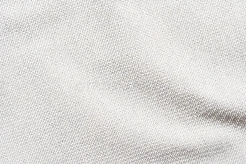Nahaufnahme eines weichen, weißen Baumwolllakens, das seine feine Webart und Textur zeigt