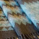 Close-up view of twill fabric showing diagonal weave pattern